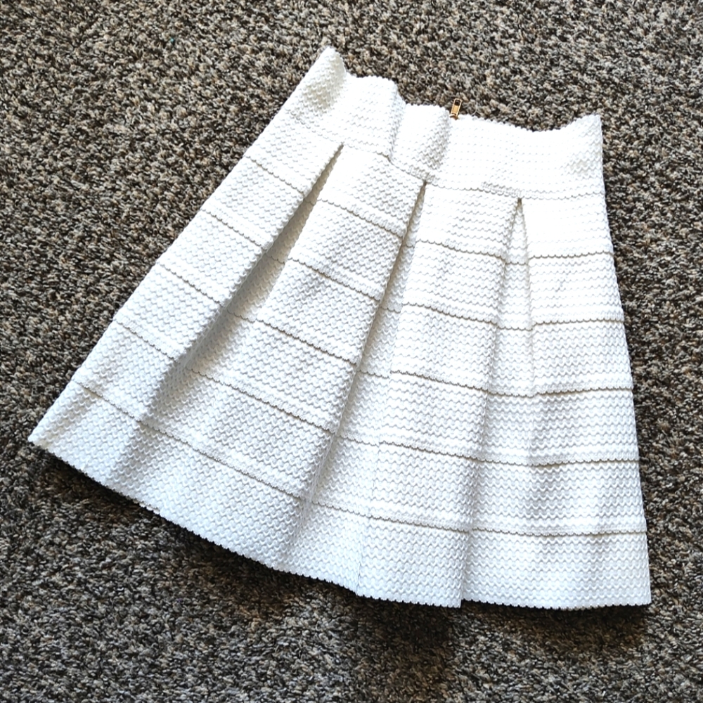 White pleated skirt